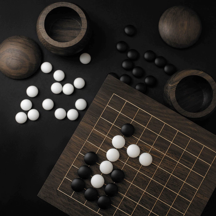 Set for playing Go made of stained oak "Morwood" with brass